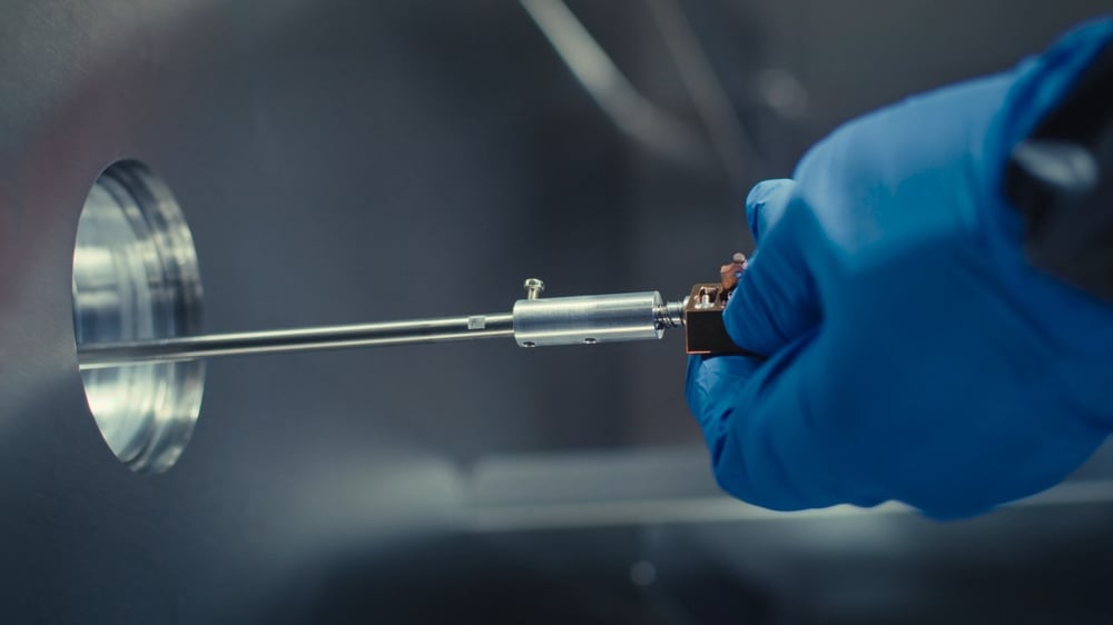 A sample holder being loaded into the ED-1 sample port