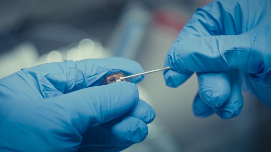 A sub-microgram sample being mounted on the ED-1 holder tip